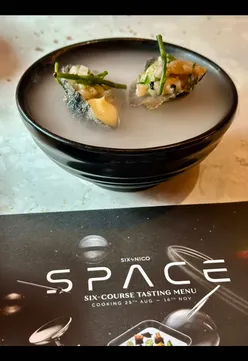 Guests enjoying Six by Nico's 'SPACE' themed six-course menu in Edinburgh, running from August to November 2025.