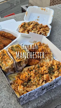 Delicious halal chicken meal at Cluckin' in Manchester, perfect for foodies and TikTok food lovers.
