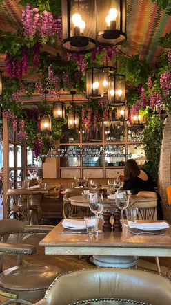 Enjoying bottomless brunch at Victors in Alderley Edge with sushi, cocktails, and a festive atmosphere.