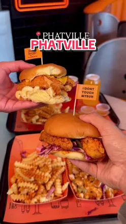 Interior of Phatbuns dark kitchen showcasing burger and fried chicken preparation in Birmingham.