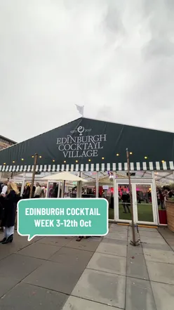 Excited attendees at Edinburgh Cocktail Week enjoying cocktails and delicious pizza from Dough La La.