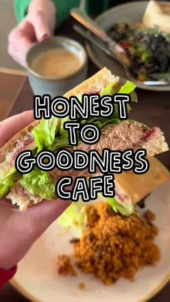 Cozy interior of Honest to Goodness cafe in Dublin, showcasing homemade dishes and a warm atmosphere.