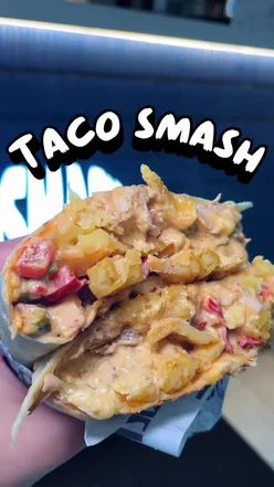Delicious French Taco with Cajun chicken and loaded fries at Taco Smash in Mile End, London, offering a fun dining experience.