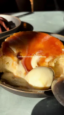 Delicious Swiss Butter dish at London’s Swiss Butter restaurant, featuring steak and molten chocolate dessert.
