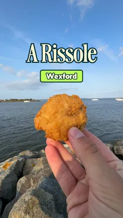 Enjoying a crispy Wexford rissole made from spuds and breadcrumbs at Sharky's Fish and Chips.