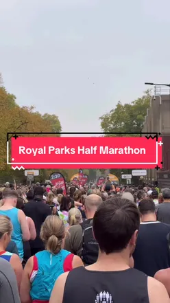 Runner celebrating achievement at the #RoyalParksHalf, advocating for girls' access to safe, supportive sports environments.