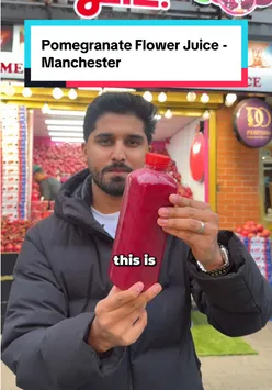 Customers enjoying fresh pomegranate juice at the new Pomegranate Flower Juice shop in Manchester.
