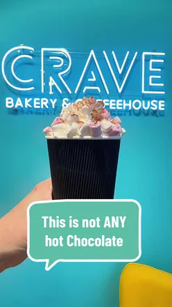 Silky smooth cinnamon bun hot chocolate at Crave Bakery, perfect for autumn in Southend and Chelmsford.