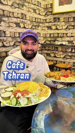 Large portions of Iranian cuisine at Cafe Tehran, a Persian restaurant in Partick, featuring kebabs and traditional dishes.
