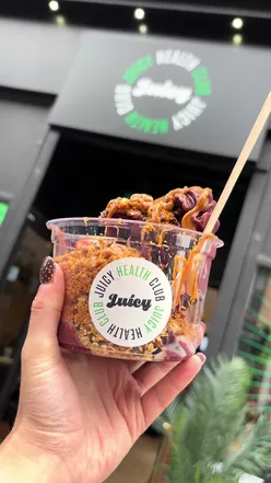 Delicious wraps and smoothies at Juicy UK, showcasing vibrant food and a fun dining experience in Glasgow.