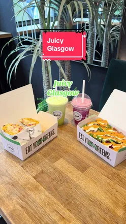 New menu items at Juicy in Glasgow, featuring drinks, Flatbread wraps, Salad Boxes, and Açai Whip dessert.