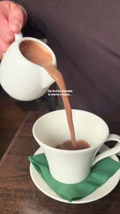 Viral hot chocolate at Petit Cafe on Lark Lane, Liverpool, famous for its indulgent and eye-catching presentation.