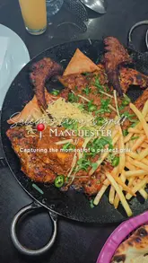“Colorful tawa platter with lamb chops, seekh kebabs, and chicken served at Saleem's Tawa & Grill in Manchester.”