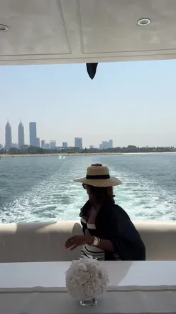Vlogger shares moments in Dubai, featuring Atlantis The Royal, with heartfelt community engagement.