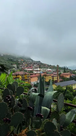 Cascate del Varone waterfall in Riva del Garda, Italy, with lush greenery and misty caves—perfect for exploring.