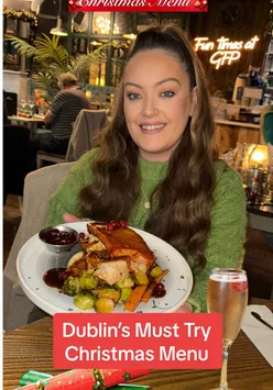 Christmas dining at Gourmet Food Parlour in Dún Laoghaire, enjoying a festive menu with Prosecco by the harbor.
