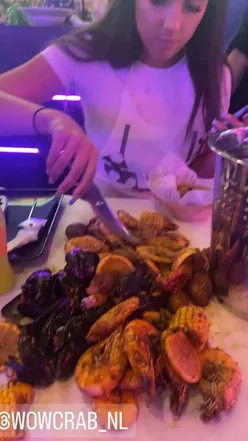 Delicious churros and seafood boil featured in an Amsterdam food scene photo. #amsterdam #netherlands #cake #churros