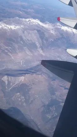 Travel enthusiast planning future trips with Luxury Escapes, highlighting current sale on top destinations.