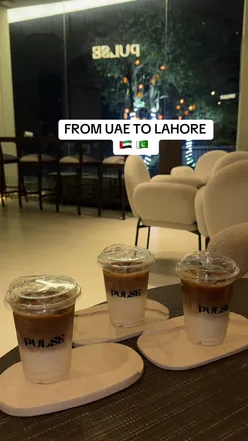 Enjoying coffee and snacks at Lahore Cafe in UAE, a vibrant spot for Pakistan-inspired cuisine and culture.