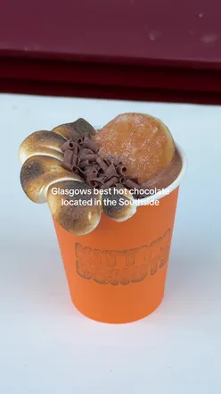 'Hot chocolate topped with marshmallow fluff and a sugar donut hole from Kitty’s Donuts in Glasgow's Southside'