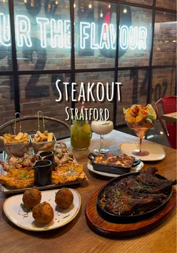 'Delicious prawn platter served at a vibrant halal restaurant in London, perfect for foodie enthusiasts.'