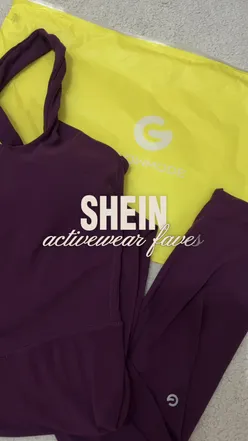 Influencer promoting SHEIN sportswear and app with discount code in stylish setting.