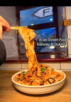 Authentic Chinese takeaway at Xi'an Street Food in Dublin & Galway, featuring Biang Biang Noodles and Spice Bag.