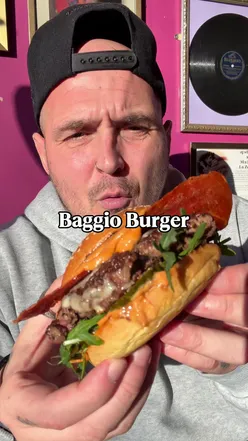 Delicious Baggio Burger and crispy chicken wings at Baggio Burger in Walthamstow, showcasing Italian fusion street food.
