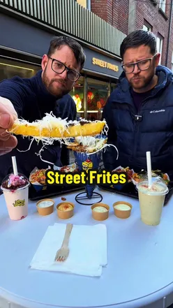 Loaded fries feast at Street Frites, featuring truffle, tempura, and Korean chicken frites, with unique milkshakes.