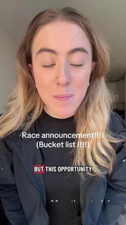 Runner training for a marathon with a scenic view in the background, showcasing dedication and perseverance.