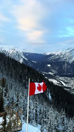 Snow-covered landscapes in Banff, Whistler, and Vancouver showcasing Canada's enchanting winter beauty.