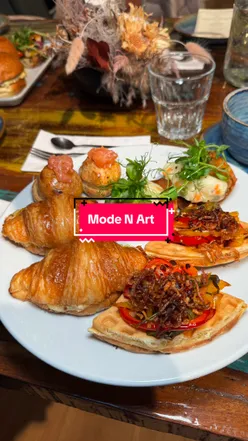 Guests enjoying seasonal pastries and specialty coffee at Mode N Art bakery-café in Sale's Hereford Street.