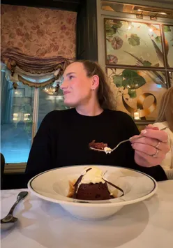 Scottish content creator enjoying a scenic moment in Glasgow, capturing the vibe for a vlog.