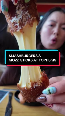 Juicy Smashburgers and Nashville Butter Mozzarella Sticks at Top Hski's in Glasgow, showcasing top-notch ranch sauce.