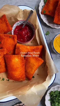 Delicious creamy chicken bread parcels, perfect for Ramadan Iftar, featuring chicken, cheese, and spices.