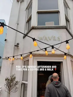 Cozy café interior of WAVES Coffee Bar & Patisserie, perfect for coffee and Sunday strolls along Roker beach.
