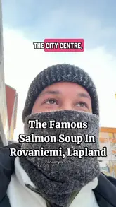 A travel vlog featuring a visit to 21 Cafe & Bar in Rovaniemi, Finland. The creator reviews the famous salmon soup, along with other dishes like tacos and fries, providing a personal recommendation for visitors to the area.