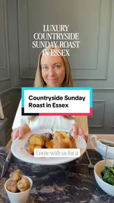 A creator visits Downham Hall Hotel in Essex to review their Sunday roast. The video features shots of the hotel exterior, the elegant dining room, the menu, drinks, and close-ups of the food, including scallops and a traditional roast dinner.
