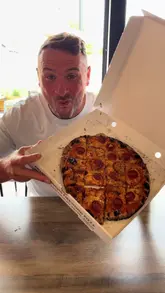 A creator-led tour of 'Platform Street Food' in Cardiff Bay, highlighting several different vendors including a pizza place, an ice cream shop, a coffee bar, an Italian pasta spot, and a burger joint. The video features shots of the venue exterior, the food being served, and the creator trying the various dishes.