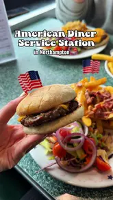 A short video showcasing '81 Hamburger Heaven in Northampton, highlighting its American diner-style decor and menu. The video features shots of burgers, loaded fries, and the restaurant's interior, emphasizing a nostalgic, retro atmosphere.