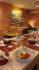 The video documents a children's pasta-making class at Pasta Evangelists, showing the process from arrival to the final meal. It highlights the interactive nature of the activity, making it an appealing option for parents planning birthday parties or family outings.