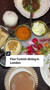 A high-quality, fast-paced montage showcasing a variety of Turkish dishes, cocktails, and desserts at a restaurant in Mayfair. The video uses smooth, close-up shots to highlight the textures and presentation of the food, accompanied by upbeat music and minimal text overlays.