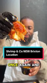 A review of a new seafood and chicken restaurant in Brixton, featuring a variety of dishes including a sharing platter, lobster, and dessert.