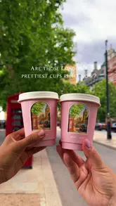 A short, aesthetic reel featuring two pink coffee cups with London landmark illustrations, held up against various backdrops in Covent Garden to highlight their 'cuteness'.
