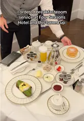 A vlog-style video showcasing an in-room breakfast experience at the Four Seasons Hotel London, highlighting the exceptional service and the luxury suite.
