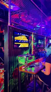 A short, upbeat video showcasing NQ64 Arcade Bar, highlighting the retro gaming experience and themed cocktails. The video features a montage of various arcade machines, the bar menu, and close-ups of signature drinks with gaming-inspired garnishes.