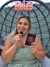 A creator discusses her experience booking a mystery holiday for her family, explaining the process and encouraging viewers to guess the destination for a discount.