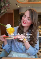 A short, aesthetic reel featuring a creator enjoying an Amalfi lemon sorbet served in a hollowed-out lemon at Osteria by Bocconcino in London. The video focuses on the presentation of the dessert with close-up shots and a brief glimpse of the restaurant interior.